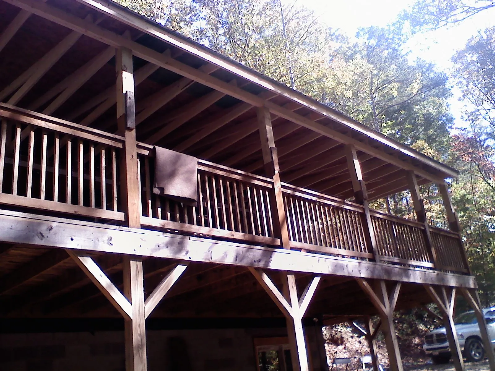 Timber framing under a new elevated porch and deck — Roof Leak Repair in Webster by Roofing Brothers